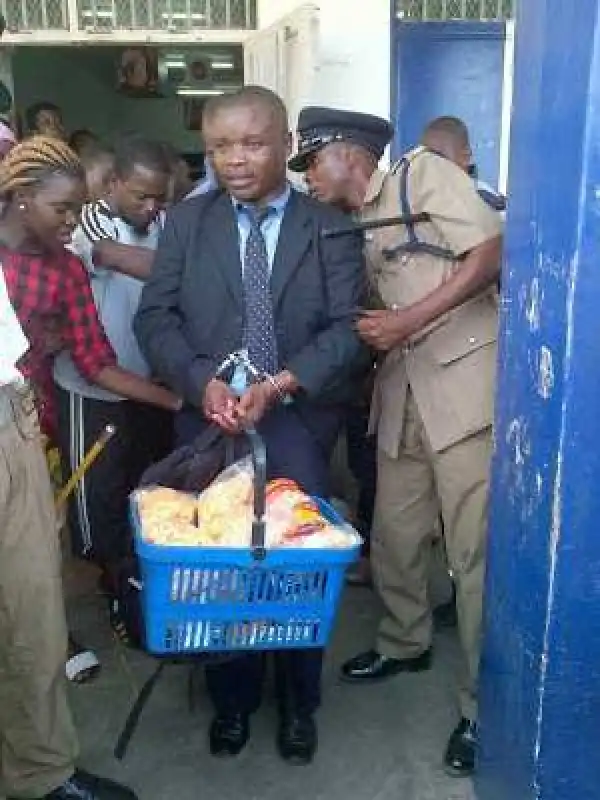 Man Dressed In Suit And Tie Caught Stealing Baby Food (Photos)